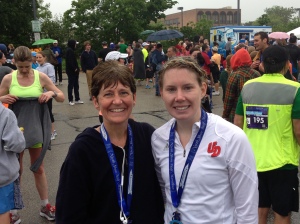 Aunt Bernadette and I after the race.  I did a sweet hair braid.  We are wet and cold!